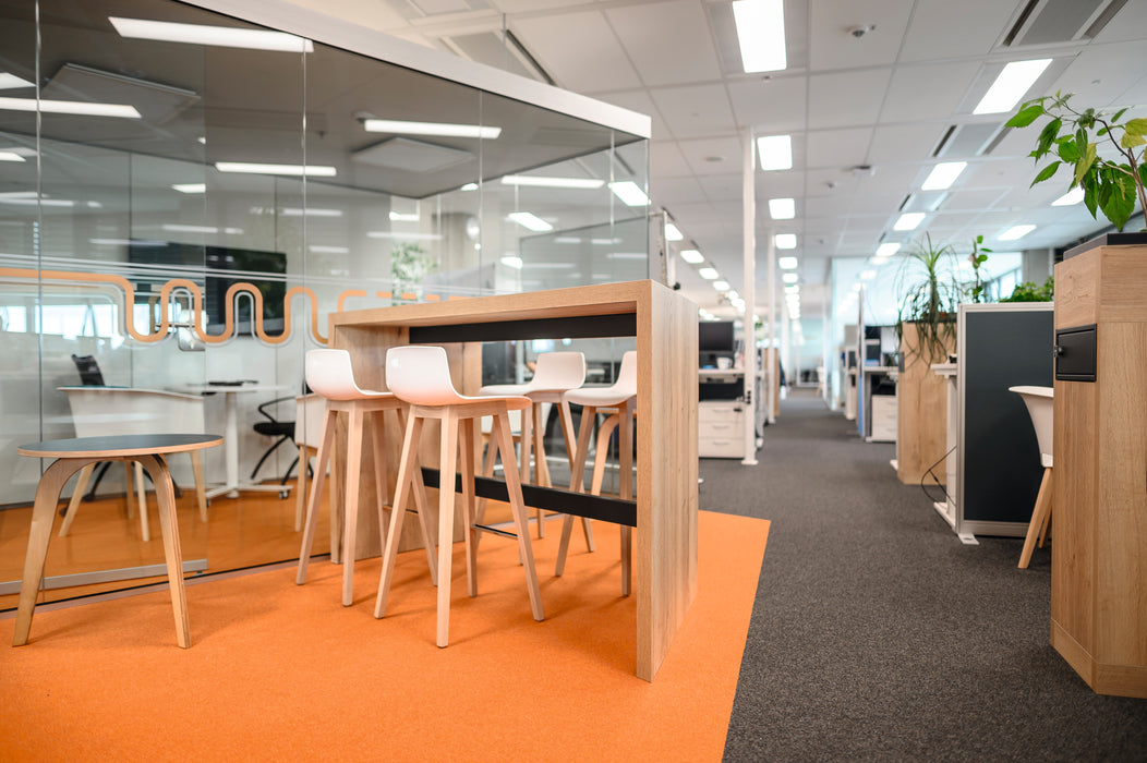 EGGER H1180 Natural Halifax Oak in a finished office interior, combined with grey and black